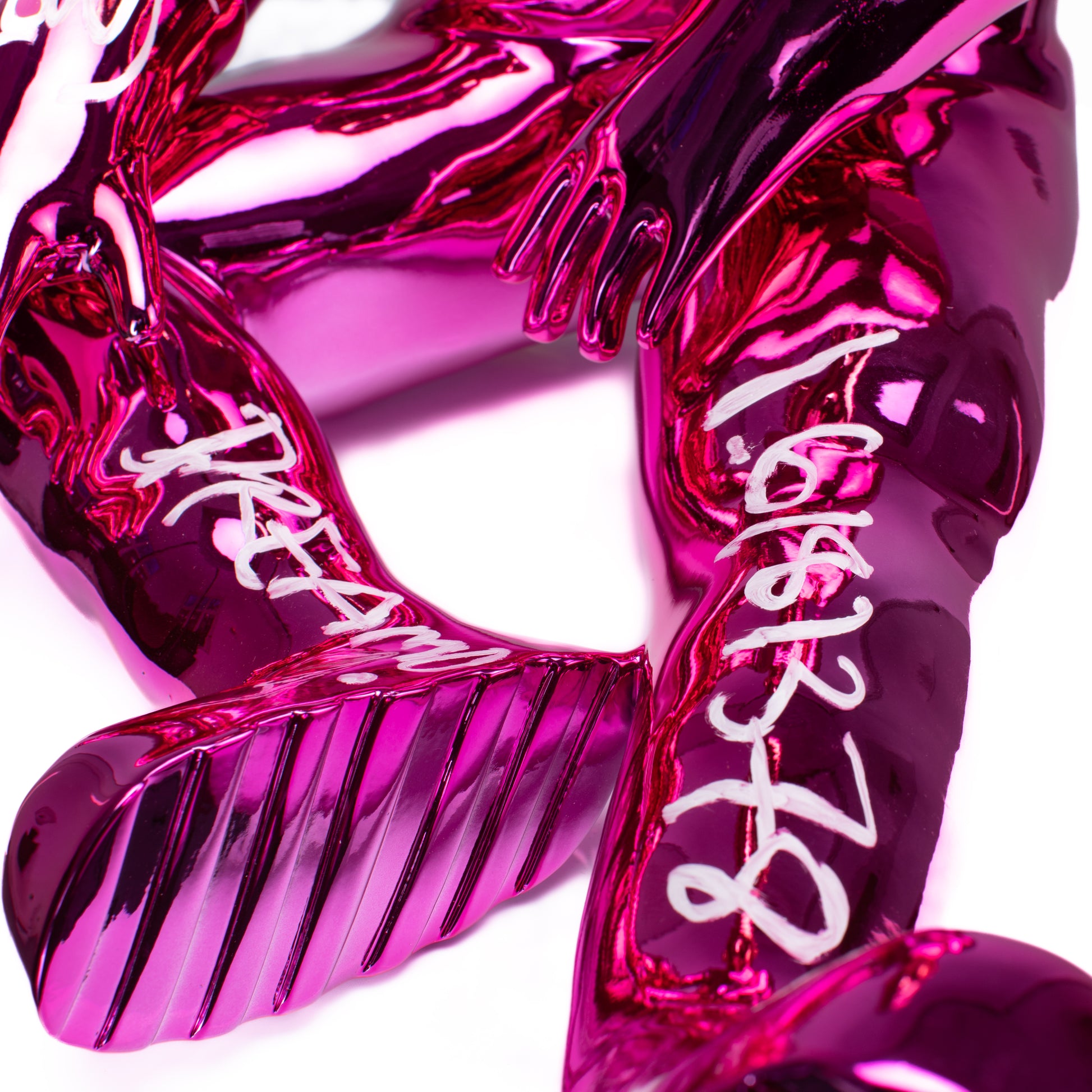 THE SITTING SPACEMAN (PINK/GOLD)